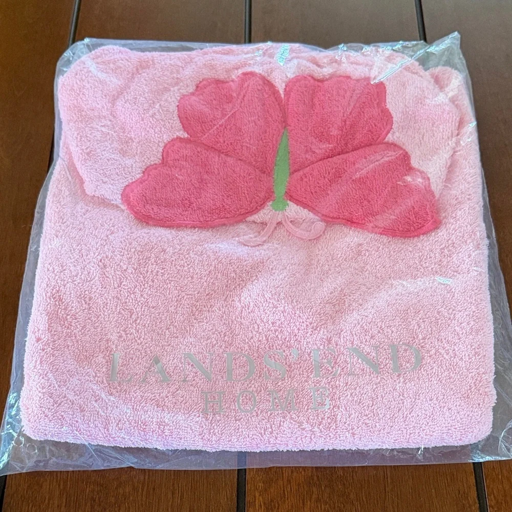 Pink hooded baby towel with a butterfly design. Land’s End